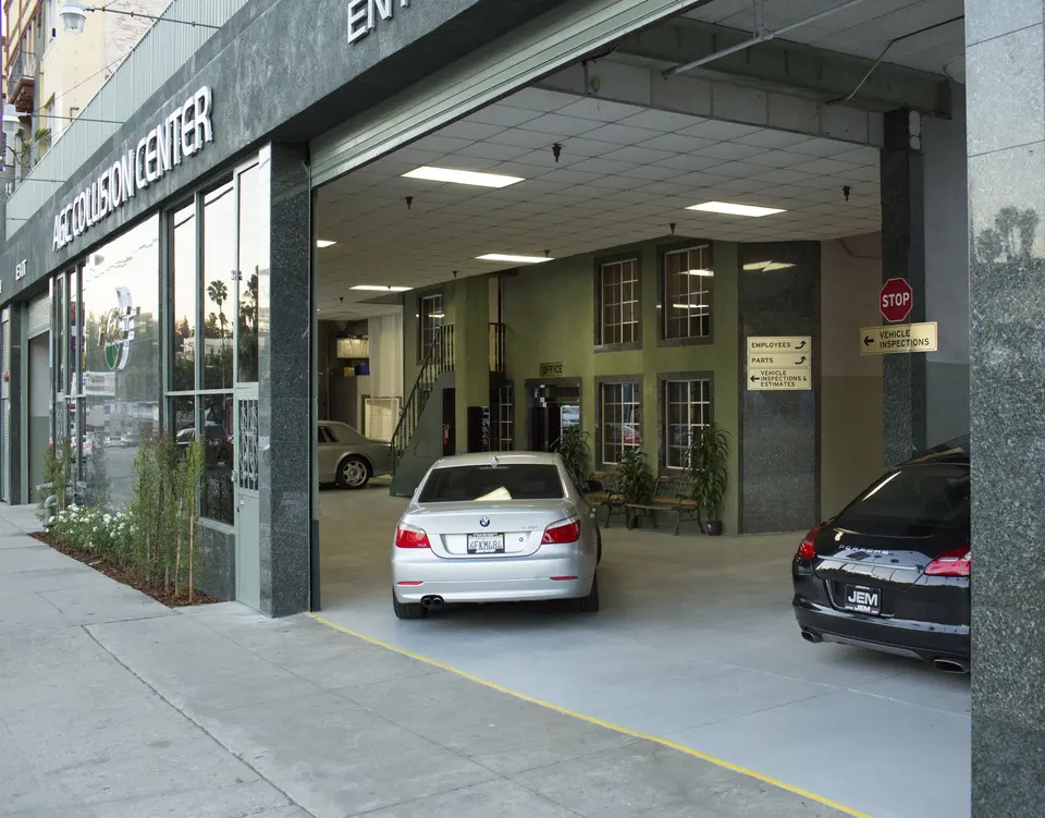 Covered customer drive-in entrance at AGC Collision Center