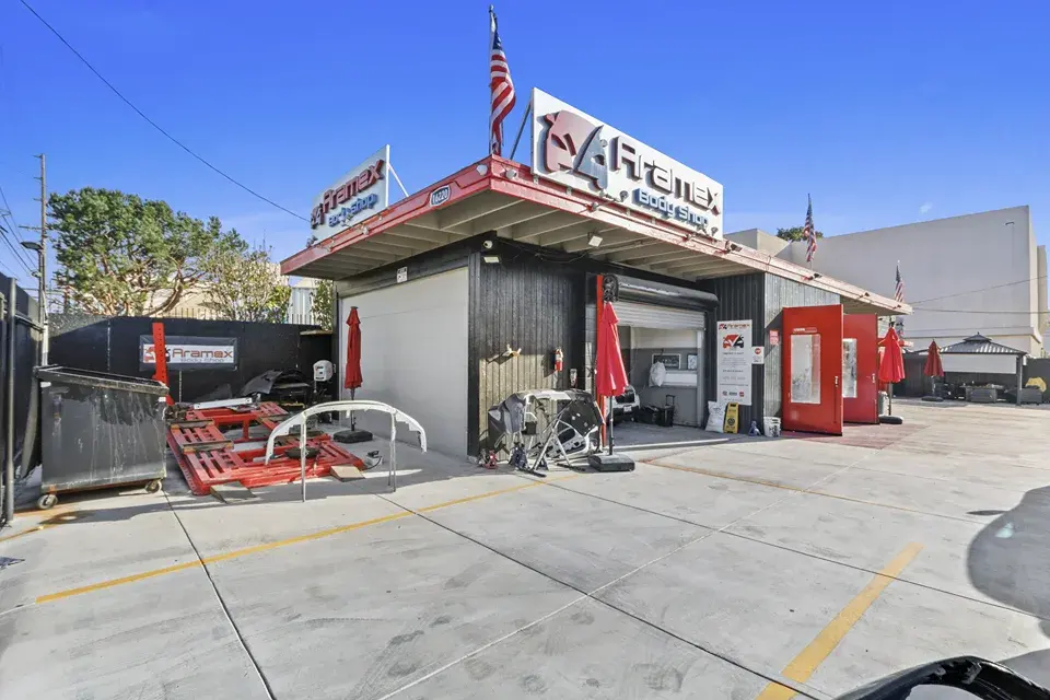Corner view of the Aramex Body Shop building