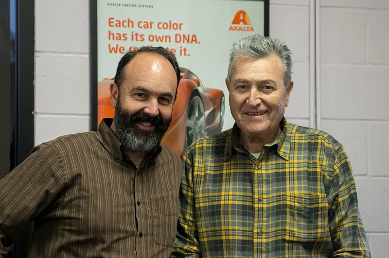 Owners Jorge Longhi Jr. and Jorge Longhi Sr. inside the shop office
