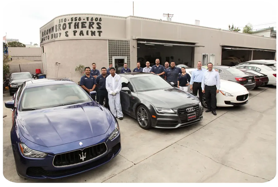 Brown Brothers Auto Body team in front of the shop