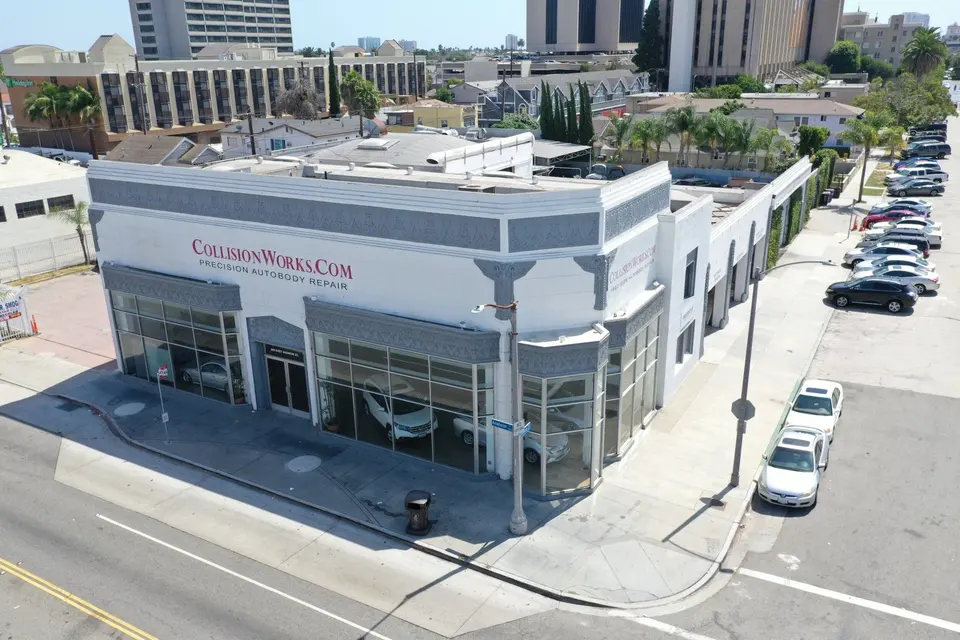 Aerial view of the CollisionWorks corner building on E Anaheim St