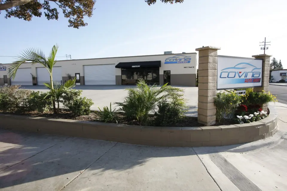 Covina Auto Body monument sign and building on E Front St