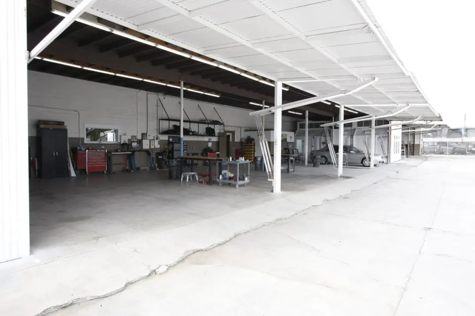 Covered rear work area at Covina Auto Body