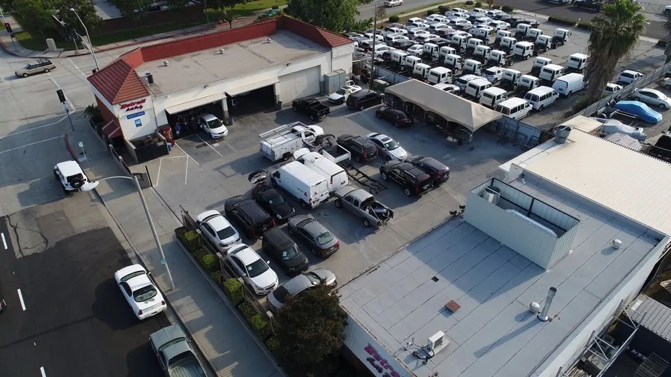 Aerial view of the Detroit Auto Body facility and lot in Covina