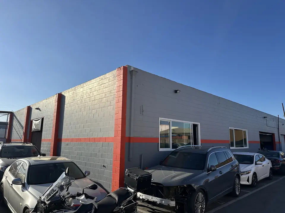 Side of the Easy Fix Auto Body building on Gardena Blvd