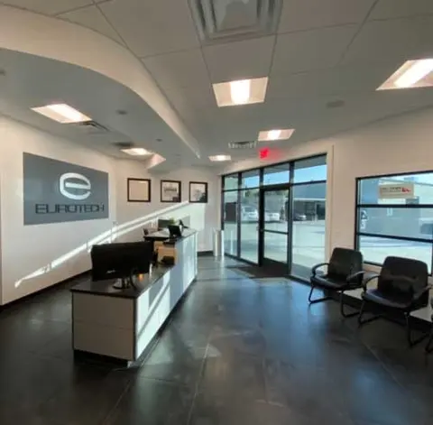 Reception lobby with front desk and Eurotech wall sign
