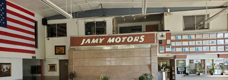 Customer lobby at Jamy Motors with the shop sign, San Gabriel