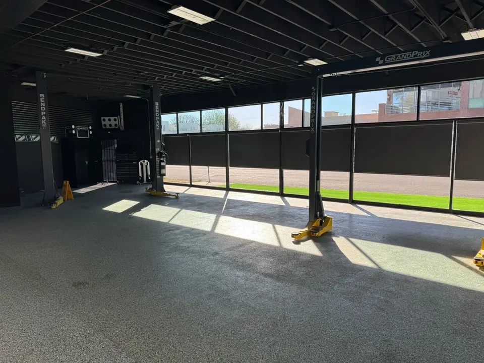 Service floor with lifts inside Lakeside Auto Center
