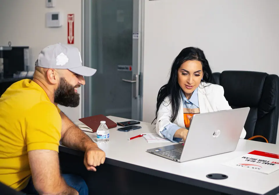 Customer meeting with an advisor in the My Car office