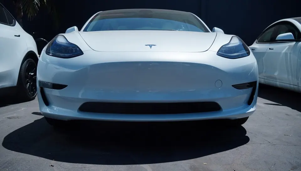 The repaired Tesla Model 3 front end after collision repair