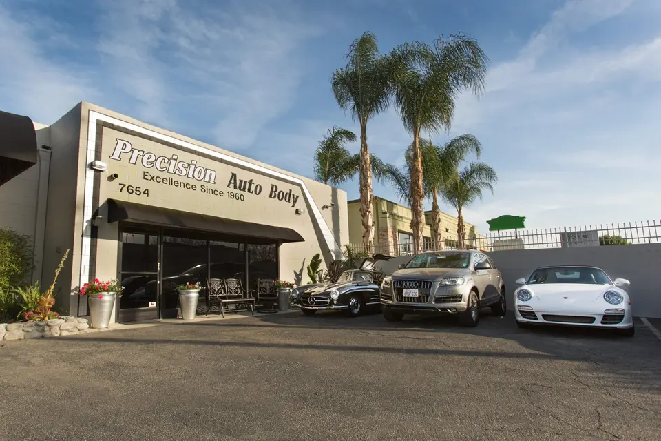 Front of Precision Auto Body on Tampa Ave