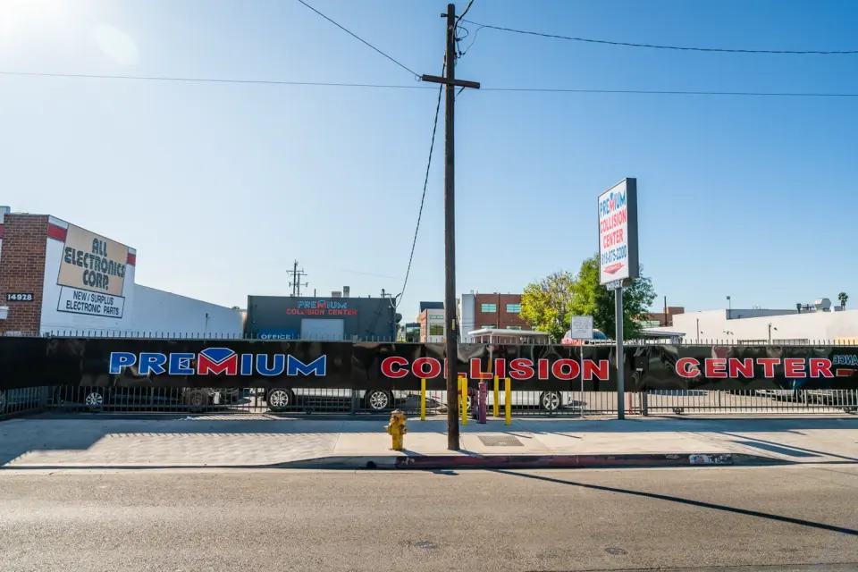 Premium Collision Center frontage and sign on Oxnard St