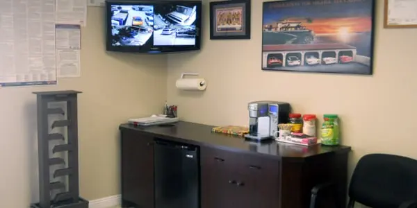Coffee station in the customer lounge at Silver Lake Auto Body & Paint