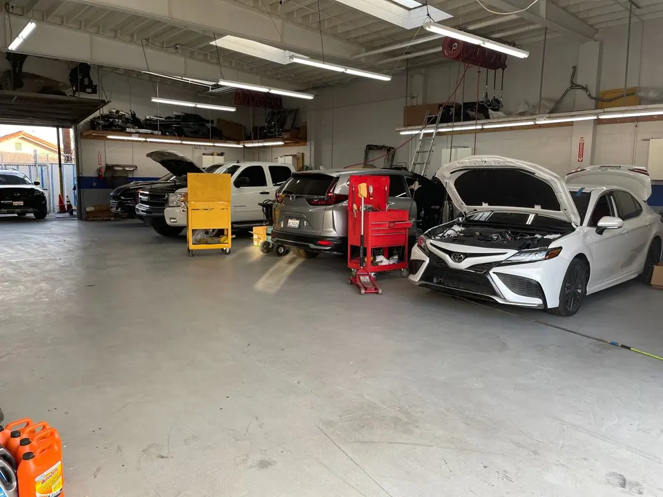 Body technician stalls inside the Streamline Collision shop
