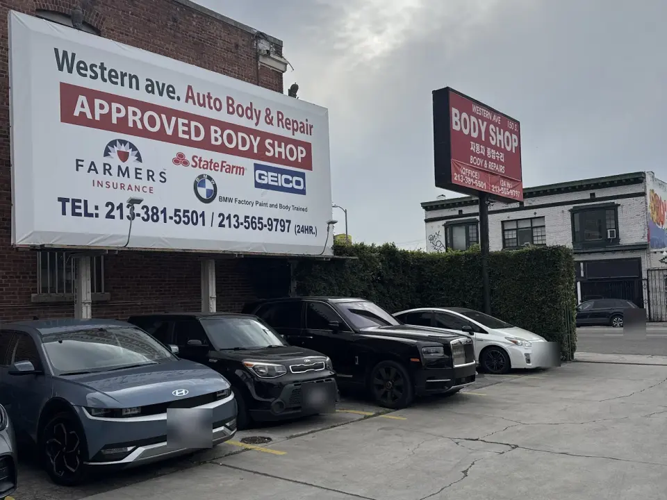 Approved body shop sign and lot at Western Ave Auto Body